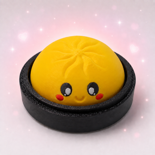 Yellow kawaii dumpling clicker fidget toy in steamer basket